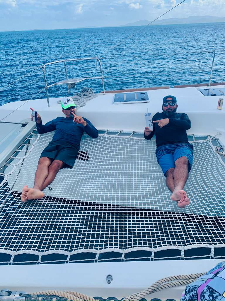 Angie and Ed relaxing on the trampoline of S/V Elation BVI